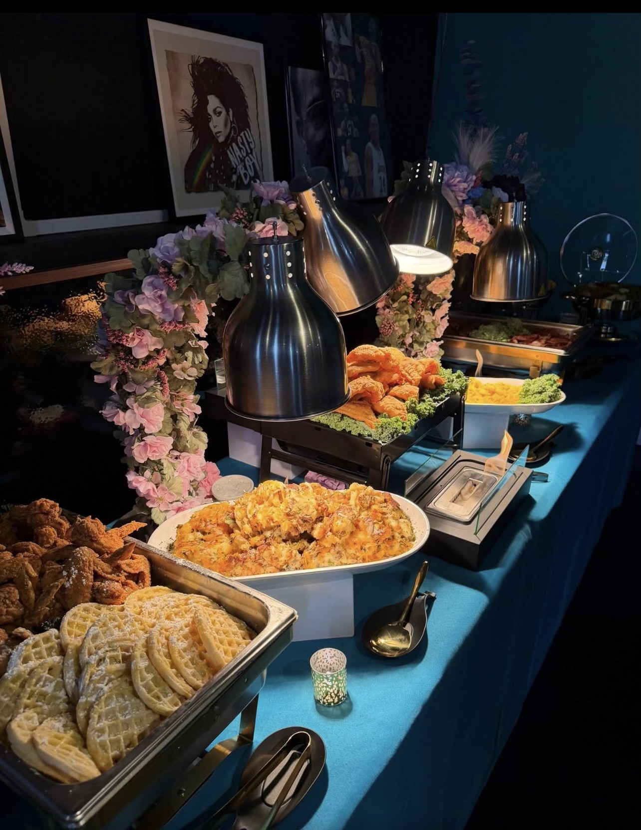 Catering buffet with chicken, waffles, and baked mac and cheese